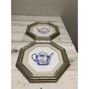 Pair of silver toned framed decorative teapot pictures